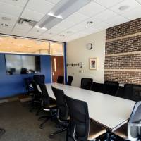 small room with LCD screen